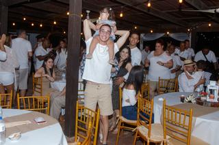 José Gabriel Maldonado (al centro con su hija) / Foto por: Cheery Viruet